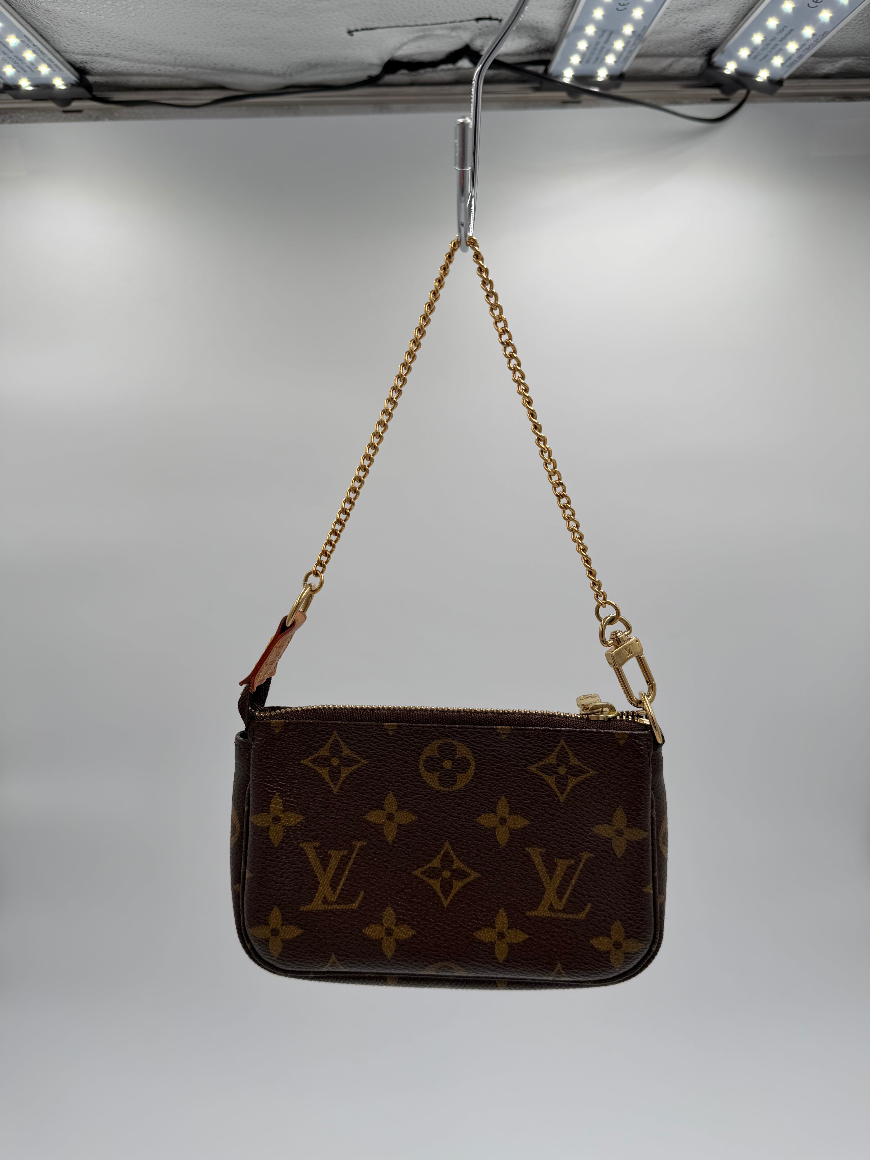 Louis Vuitton Limited Edition Monogram "Trunks & Bags" Mini Pochette